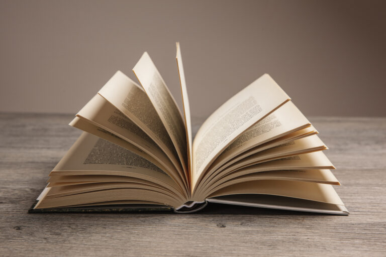 Pages Between Us book composition with open book